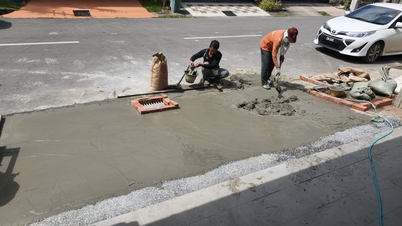Concrete preparation work outside a property